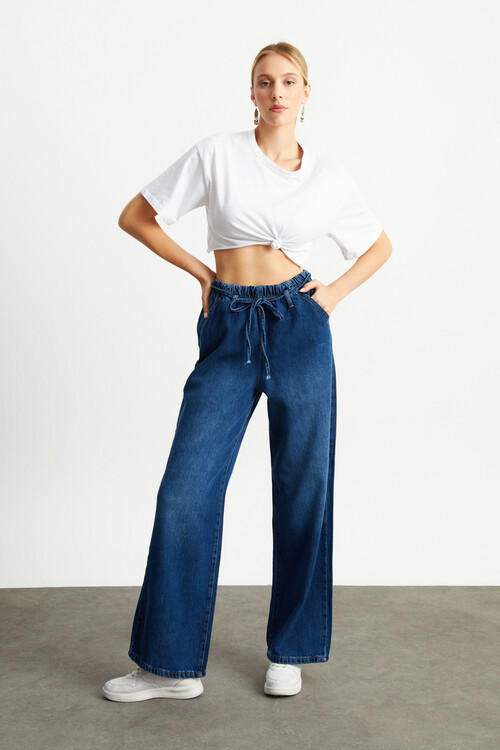 W1638 KOYU MAVİ BELDEN LASTİKLİ BOL PAÇA JEAN